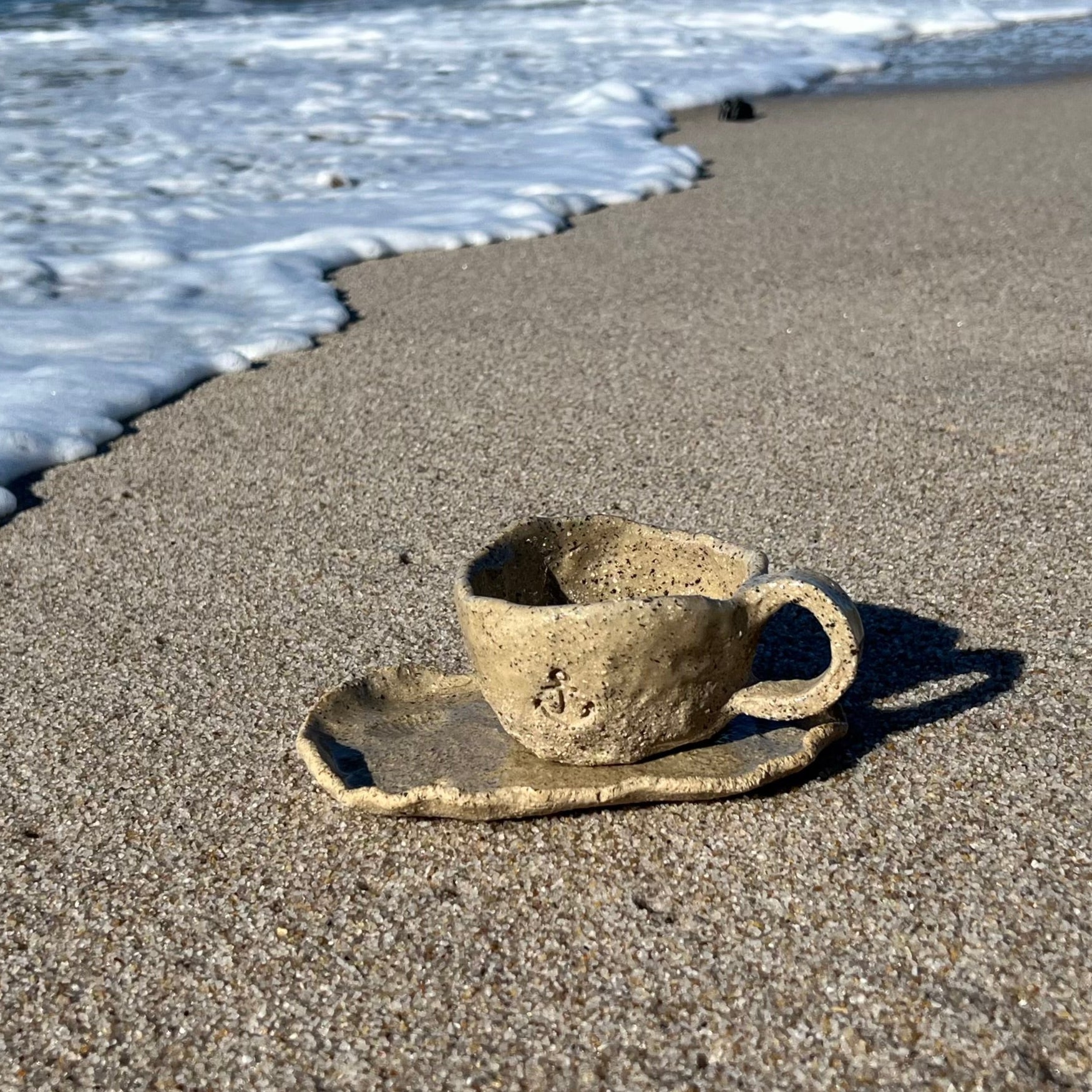 Tasse und Untertasse maritim