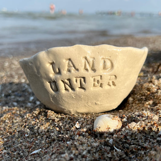 Strand: Schale LAND UNTER